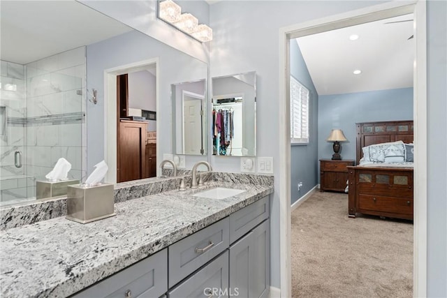 2247 Bella Ave, Upland, CA 91784 - ensuite bathroom featuring a shower stall, vanity, and baseboards