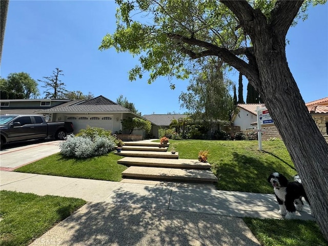 19020 Killoch Way, Porter Ranch, CA 91326 - view of front of home with a garage and a front yard