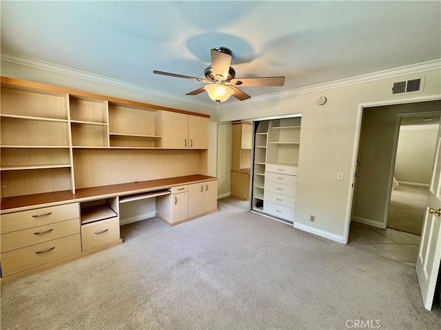 19020 Killoch Way, Porter Ranch, CA 91326 - unfurnished office with built in desk, ornamental molding, light colored carpet, a ceiling fan, and baseboards