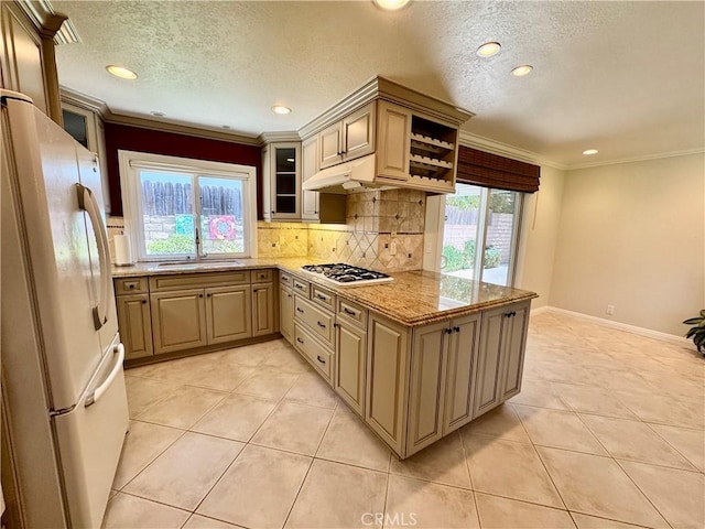 19020 Killoch Way, Porter Ranch, CA 91326 - kitchen with white appliances, a sink, crown molding, light tile patterned flooring, and backsplash