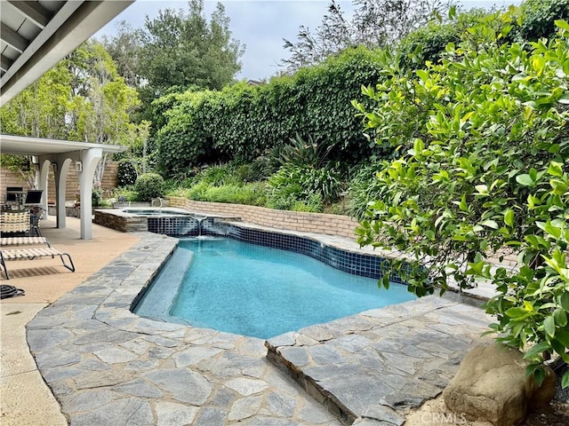 19020 Killoch Way, Porter Ranch, CA 91326 - view of swimming pool featuring a patio area and a pool with connected hot tub