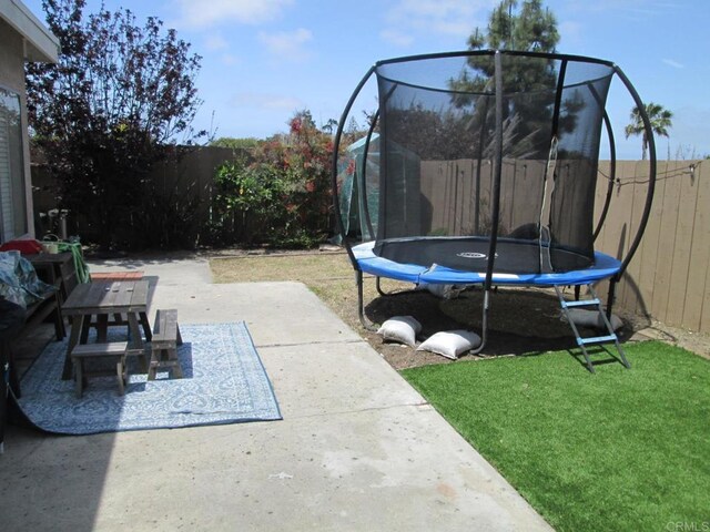 2640 Luciernaga St, Carlsbad, CA 92009 - view of yard with a trampoline and a patio