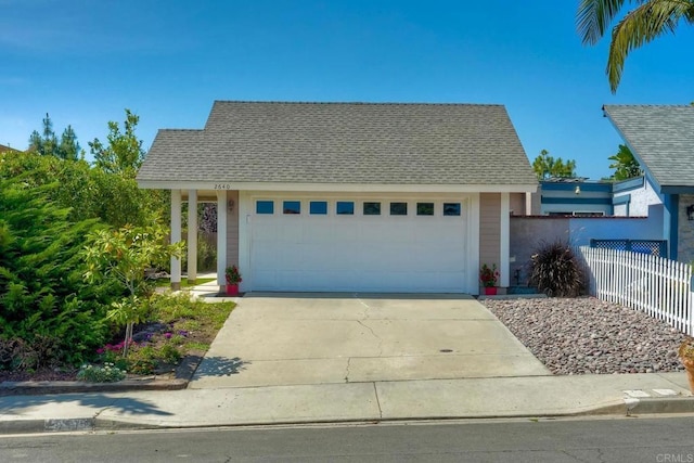 2640 Luciernaga St, Carlsbad, CA 92009 - view of front of house with driveway, roof with shingles, and a garage
