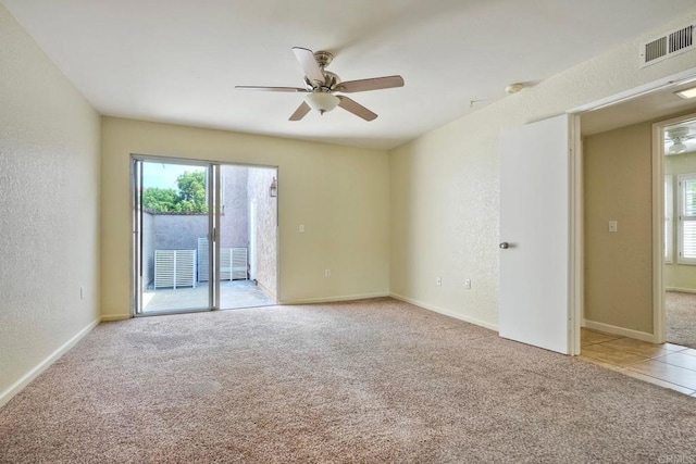 2640 Luciernaga St, Carlsbad, CA 92009 - empty room with carpet flooring, a ceiling fan, plenty of natural light, and a textured wall