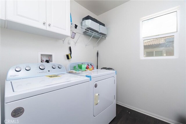 11952 Saxton Way, Victorville, CA 92392 - clothes washing area featuring cabinet space, washing machine and dryer, baseboards, and dark wood-type flooring