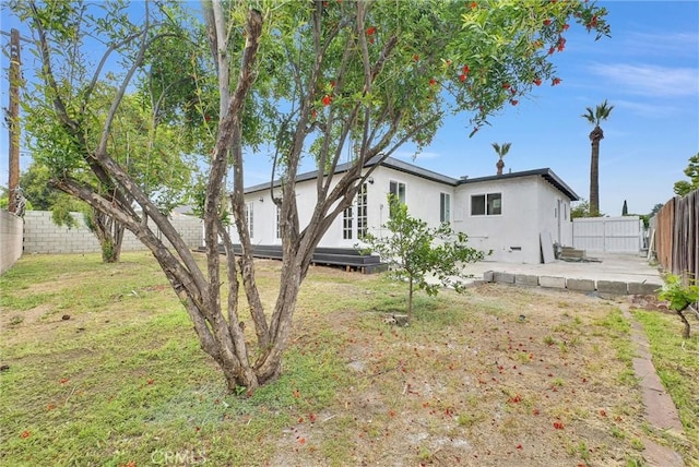 4531 N De Lay Ave, Covina, CA 91722 - rear view of house with stucco siding and a patio area