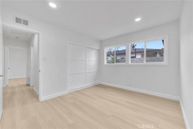 4531 N De Lay Ave, Covina, CA 91722 - spare room with light wood finished floors, baseboards, and recessed lighting