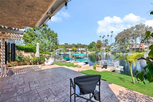 view of patio / terrace featuring a water view