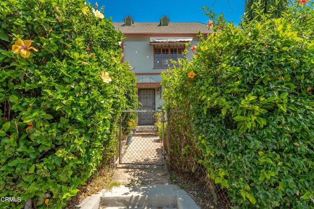 6154 Fountain Ave, Hollywood, CA 90028 - view of front of property featuring a gate and stucco siding