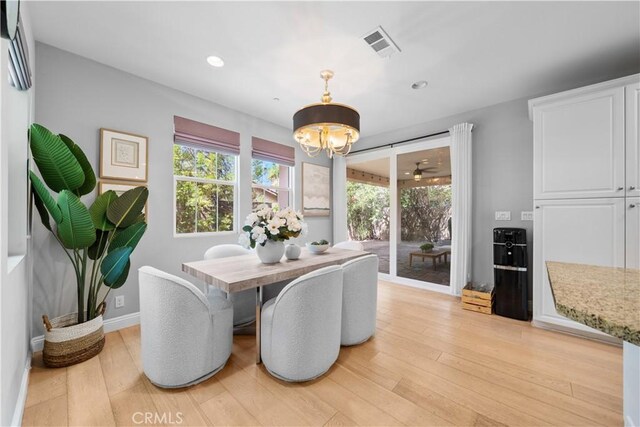 228 Wicker, Irvine, CA 92618 - dining room featuring a chandelier, light wood-type flooring, recessed lighting, and baseboards