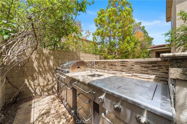 228 Wicker, Irvine, CA 92618 - view of patio / terrace featuring an outdoor kitchen, a sink, and grilling area