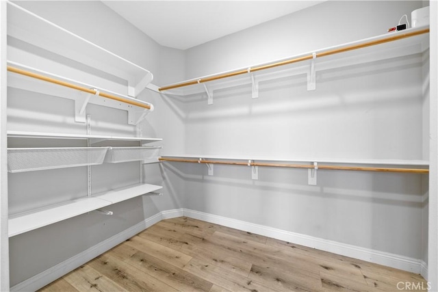 228 Wicker, Irvine, CA 92618 - spacious closet with wood finished floors