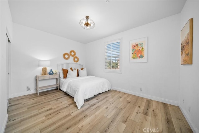 228 Wicker, Irvine, CA 92618 - bedroom with wood-type flooring and baseboards