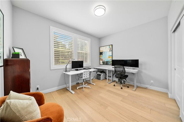 228 Wicker, Irvine, CA 92618 - office area featuring wood finished floors and baseboards
