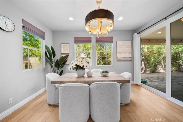 228 Wicker, Irvine, CA 92618 - dining area with baseboards, light wood-style flooring, recessed lighting, and a chandelier