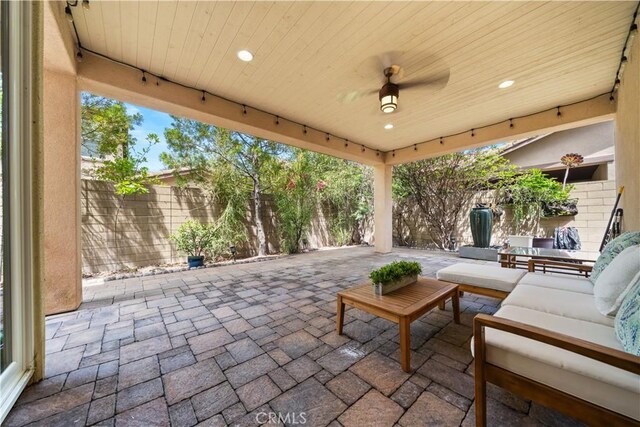 228 Wicker, Irvine, CA 92618 - view of patio with a fenced backyard, an outdoor hangout area, and a ceiling fan