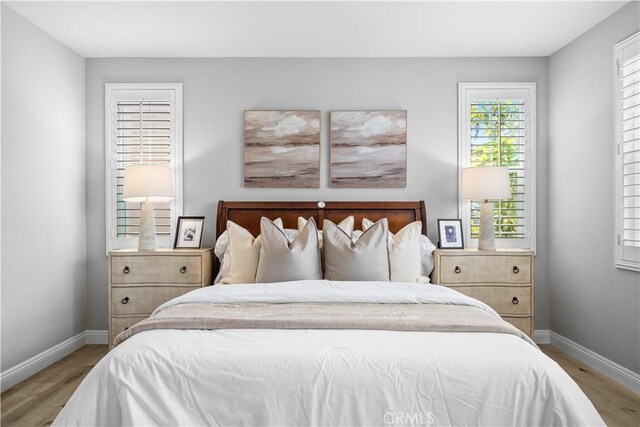 228 Wicker, Irvine, CA 92618 - bedroom with wood finished floors and baseboards