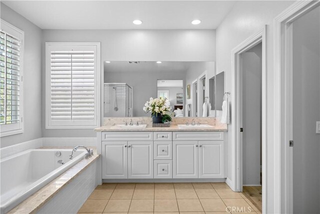 228 Wicker, Irvine, CA 92618 - bathroom with a bath, tile patterned floors, a stall shower, double vanity, and recessed lighting