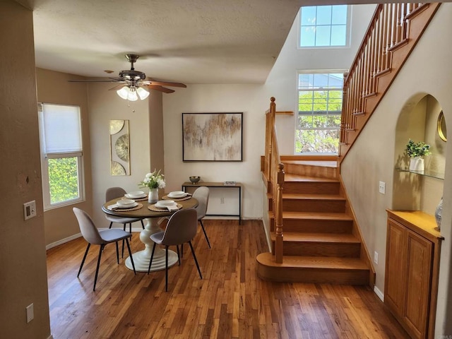 4625 68th St, La Mesa, CA 91942 - dining room with stairs, wood finished floors, plenty of natural light, and baseboards