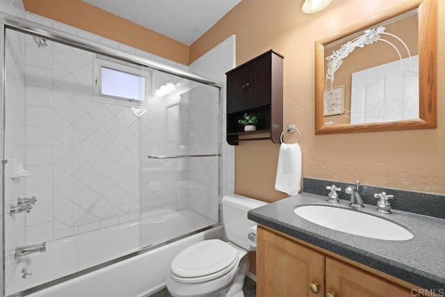 4625 68th St, La Mesa, CA 91942 - bathroom featuring vanity, toilet, combined bath / shower with glass door, and a textured wall