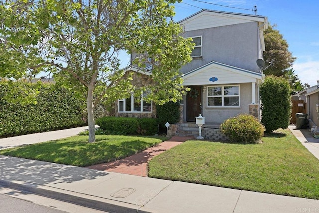 4625 68th St, La Mesa, CA 91942 - view of front of property with a front yard and stucco siding