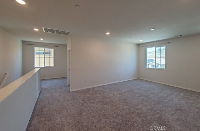 24295 Insignia Dr, Menifee, CA 92584 - unfurnished room with recessed lighting, plenty of natural light, carpet flooring, and baseboards