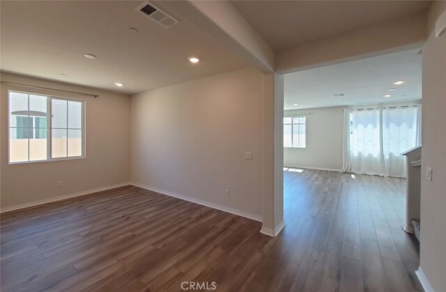 24295 Insignia Dr, Menifee, CA 92584 - empty room featuring dark wood finished floors, baseboards, and recessed lighting