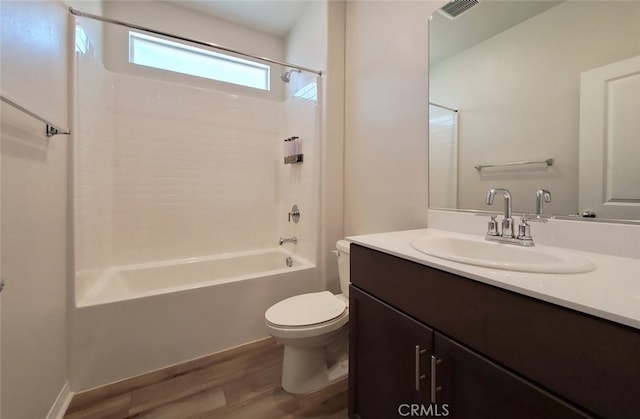 24295 Insignia Dr, Menifee, CA 92584 - full bath with wood finished floors, toilet, vanity, and shower / tub combination