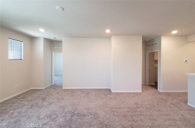 24295 Insignia Dr, Menifee, CA 92584 - spare room with carpet, recessed lighting, and baseboards