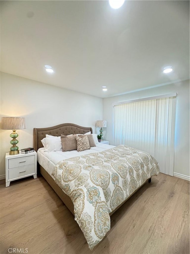 2126 S Fern Ave, Ontario, CA 91762 - bedroom with wood finished floors, recessed lighting, and baseboards