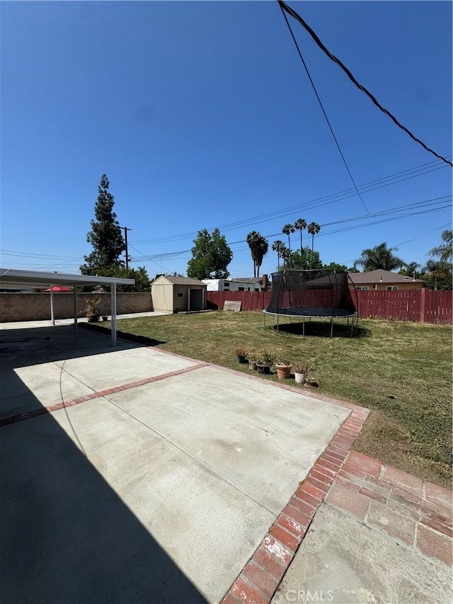 2126 S Fern Ave, Ontario, CA 91762 - view of patio / terrace featuring a trampoline, a shed, and an outdoor structure