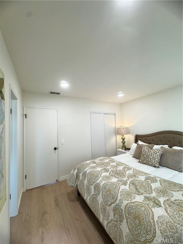 2126 S Fern Ave, Ontario, CA 91762 - bedroom featuring wood finished floors, a closet, and recessed lighting