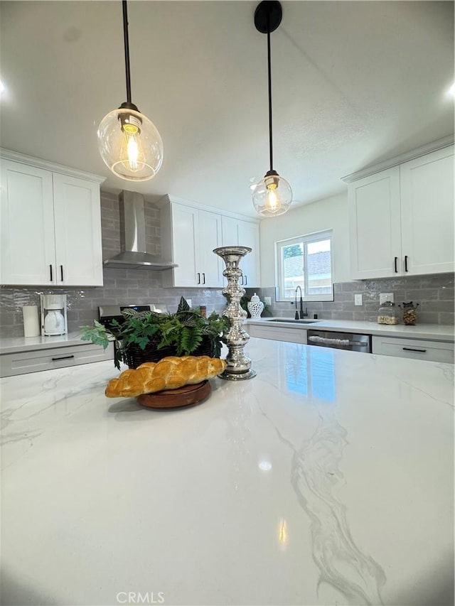 2126 S Fern Ave, Ontario, CA 91762 - kitchen with wall chimney range hood, a sink, backsplash, stainless steel dishwasher, and white cabinetry