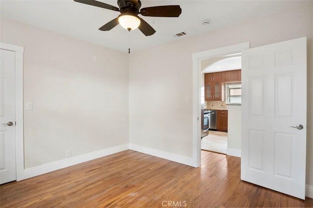 4718 Dawes St, San Diego, CA 92109 - unfurnished room featuring light wood-style floors, a ceiling fan, and baseboards