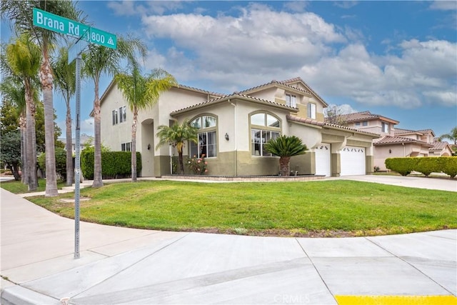 20800 Brana Rd, Riverside, CA 92508 - mediterranean / spanish-style home with stucco siding, driveway, a front yard, a tile roof, and an attached garage