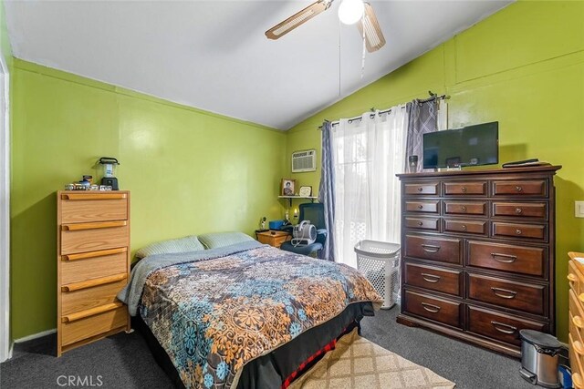 carpeted bedroom with lofted ceiling, an AC wall unit, and a ceiling fan