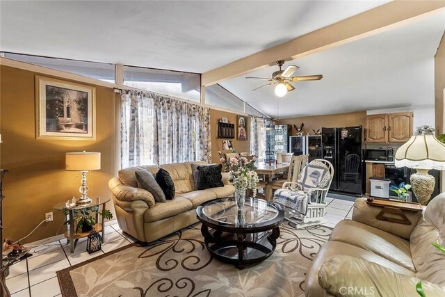 living room with light tile patterned floors and ceiling fan