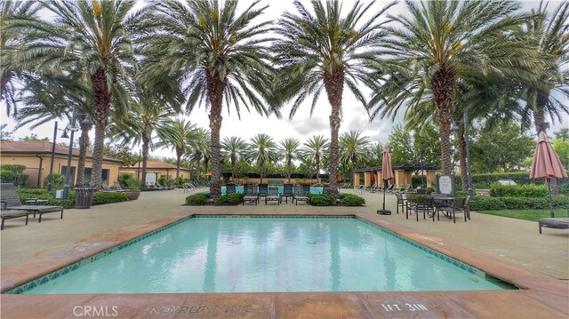 community pool featuring a patio