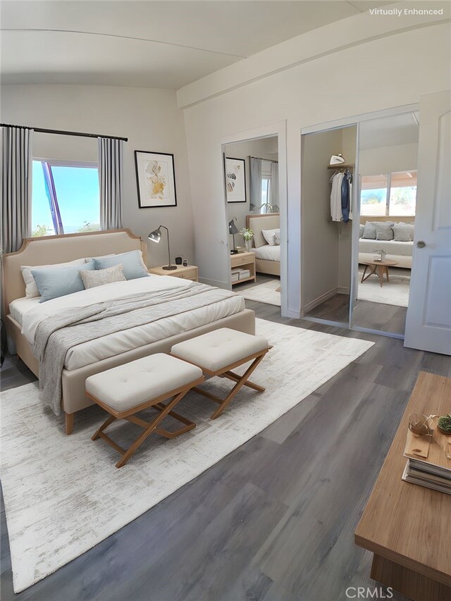 4626 Duncan Rd, Phelan, CA 92371 - bedroom featuring lofted ceiling, a closet, and wood finished floors