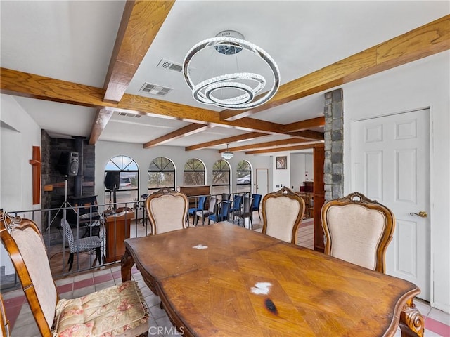 1275 Tamarack Rd, Pinon Hills, CA 92372 - tiled dining area featuring a chandelier and beam ceiling