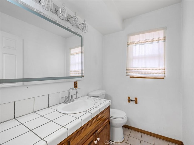 1275 Tamarack Rd, Pinon Hills, CA 92372 - half bath featuring toilet, vanity, tile patterned floors, and baseboards