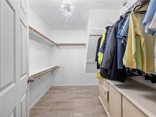 1275 Tamarack Rd, Pinon Hills, CA 92372 - walk in closet with a chandelier