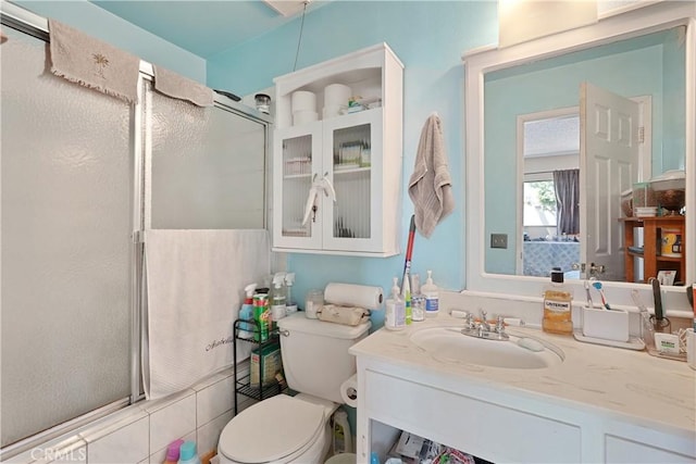 6255 Woodman Ave Unit 103, Van Nuys, CA 91401 - full bath with a shower with shower door, toilet, and vanity