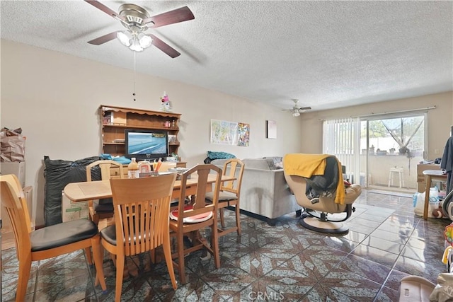 6255 Woodman Ave Unit 103, Van Nuys, CA 91401 - dining room featuring a textured ceiling and ceiling fan