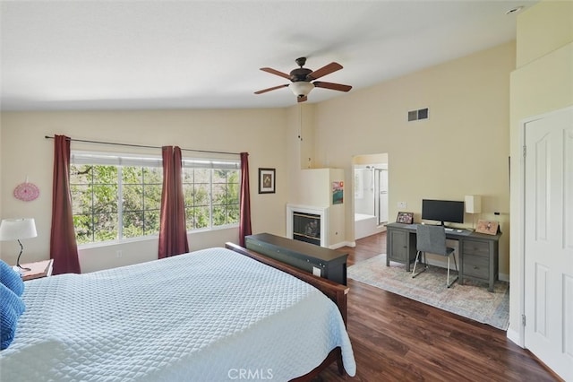 23405 Winslow Pl, Valencia, CA 91354 - bedroom with vaulted ceiling, dark wood-style floors, a ceiling fan, baseboards, and ensuite bath