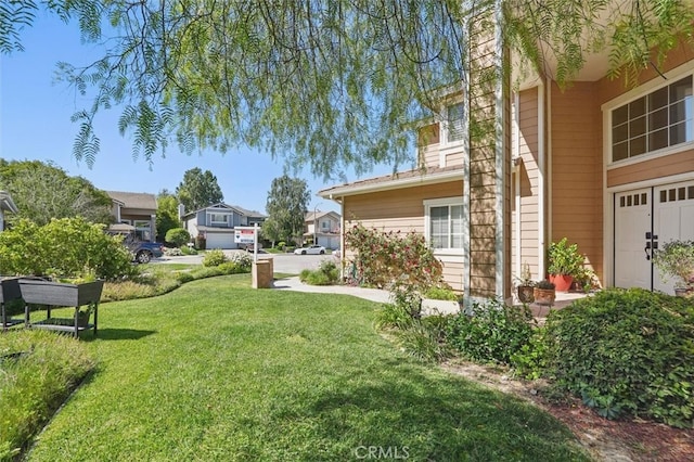 23405 Winslow Pl, Valencia, CA 91354 - view of grassy yard featuring a residential view