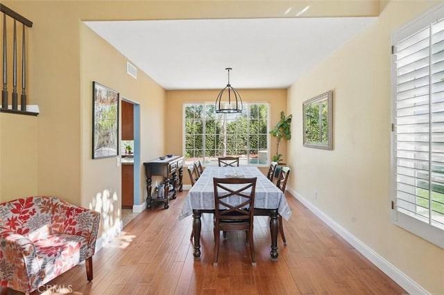23405 Winslow Pl, Valencia, CA 91354 - dining area featuring light wood-style floors and baseboards