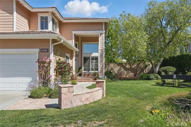 23405 Winslow Pl, Valencia, CA 91354 - view of exterior entry with an attached garage