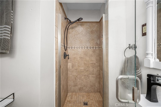 full bathroom with a shower stall