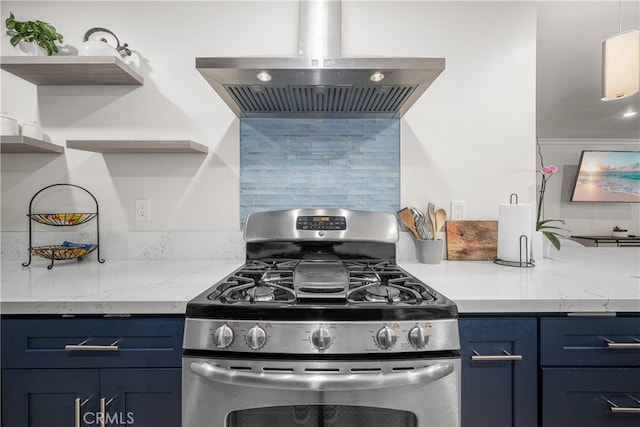 kitchen with range hood, gas stove, open shelves, blue cabinetry, and backsplash